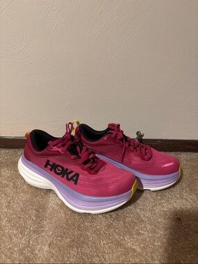 Hoka Women's Pink Running Shoes with Purple and Yellow Accents